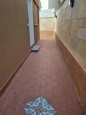 a tiled hallway with a tile floor and a building at Vida Loca -Appartamento vicino aereporto e 200mt spiaggia in Carini
