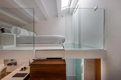 a bedroom with a bed and a glass ceiling at Kalsa miniLoft by Wonderful Italy in Palermo