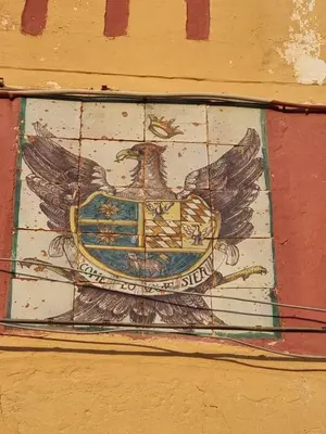 a painting of an eagle on the side of a building at B&Baglio in Carini