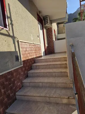a set of stairs leading to a building at Guests's Nest in Castellammare del Golfo