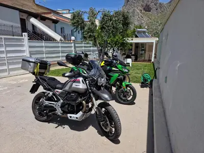 two motorcycles are parked next to a building at Casa vacanze Casuzza Sferracavallo Palermo in Palermo
