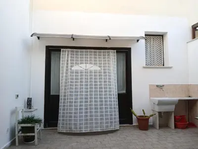 a bathroom with a shower and a sink at Casa Joe in San Vito lo Capo