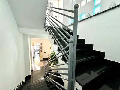 a staircase in a house with a stair case at B&B Blue in Terrasini