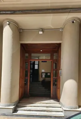 an entrance to a building with stairs and a door at La Casa Di Mitì in Palermo
