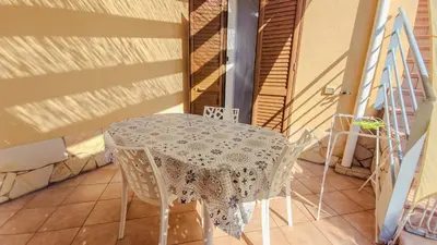 a bathroom with a toilet and a sink at Villa Lumia in Campofelice di Roccella