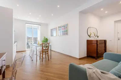 a living room with a couch and a table at Old Port Luxury Apartments in Palermo