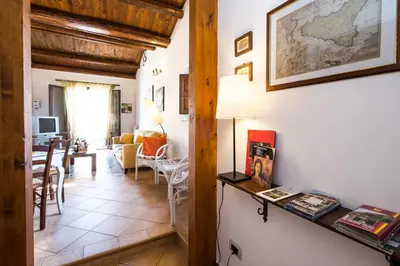 a hallway with a living room and a dining room at La Terrazza di Massimo in Palermo