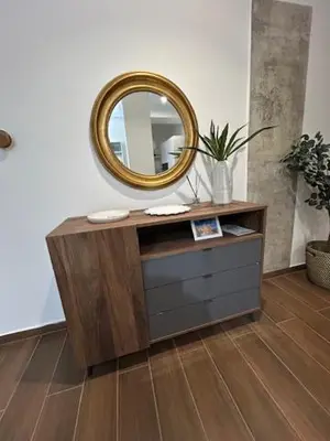 a mirror on top of a dresser in a room at Dedè Dream in Palermo