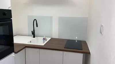 a kitchen with a sink and a counter top at Dedè Dream in Palermo