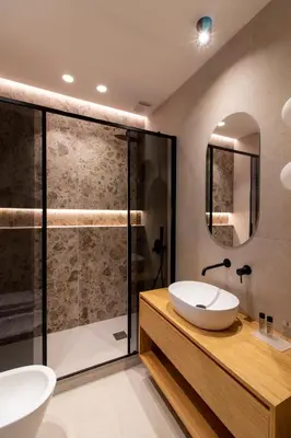 a bathroom with a sink and a shower at Lùlom - Rooftop Boutique Rooms in Palermo