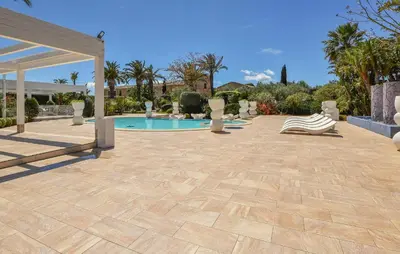 a patio with a swimming pool and a pavilion at Nice Home In Partinico With Wifi in Partinico