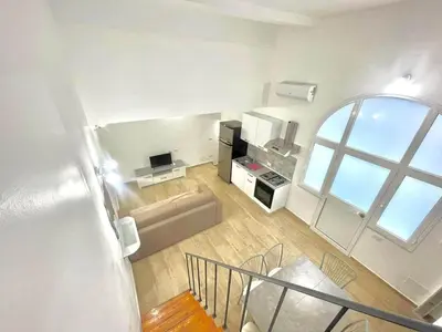 an overhead view of a kitchen with a large window at Alloggio delle Carrozze al Ballarò in Palermo