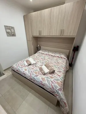 a bathroom with a toilet and a sink at Sopra Palermo in Monreale