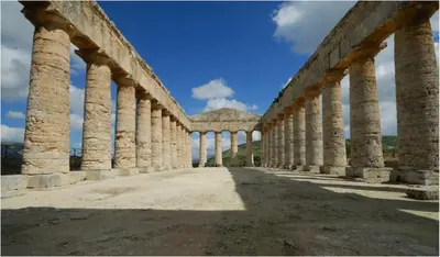 a row of columns in a building at Casa Gelferraro in Calatafimi