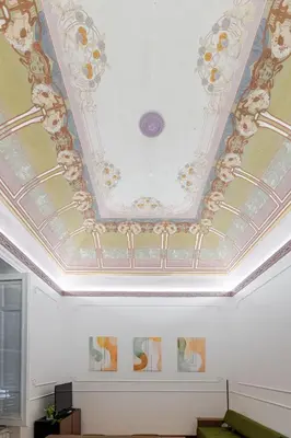 a room with a coffered ceiling with a ceiling at Liberty Boutique Apartment in Palermo