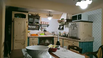 a kitchen with a table with a bowl on it at Villa Sterlizia in Castellammare del Golfo