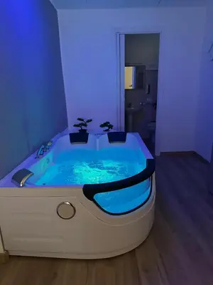 a bathroom with a large tub in a room at Lacasadelrelax in Monreale