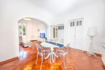 a dining room with a table and chairs at Aria di sale in Palermo