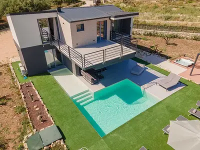 an overhead view of a tiny house with a swimming pool at Dimora Masi di GN Real Escapes in Castellammare del Golfo