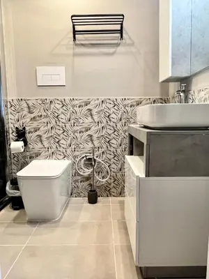 a bathroom with a toilet and a sink at B&B Dimora Emily in Palermo