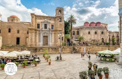 an old building with people walking in front of it at Backpackers House - Ballaró in Palermo