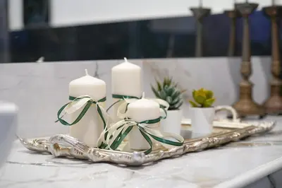 a tray with candles on top of a table at Quattro Canti 200 mt- Appartamento Salvia in Palermo