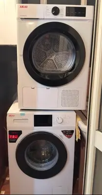 a washer and dryer stacked on top of each other at Dantes House in Palermo
