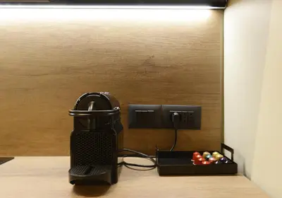 a camera is next to a box of balls at Di fronte a Suite in Palermo