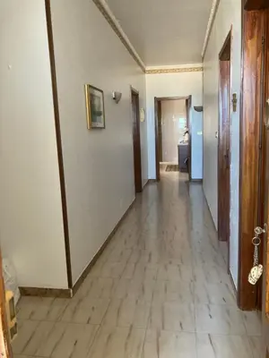 an empty hallway of a room with at House of Lady in Carini