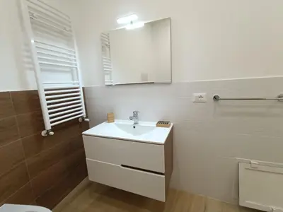 a bathroom with a sink and a toilet at NaNica in Palermo