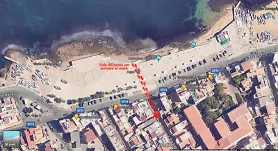 an aerial view of a beach with buildings and the ocean at B&B La Dimora di Poseidone in Bagheria