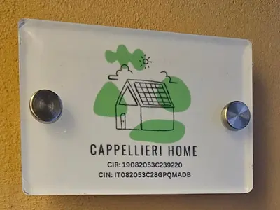 a white lightswitch with a shopping cart on it at Cappellieri Home in Palermo