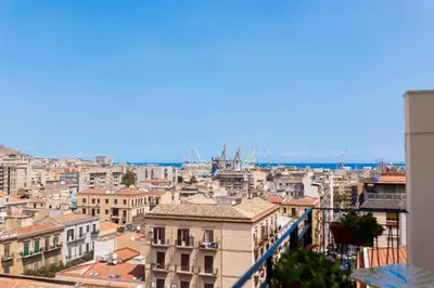a view of a city from a building at Politeama Charming Apartment in Palermo