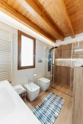 a bathroom with a toilet and a sink and a shower at Villa Michela - Dimora di Charme a Cefalù con panorama sul mare by CEFALU BIZ in Cefalù