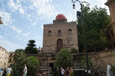 a building with a dome on top of it at Appartamento Ottanio- Quattro Canti 200 mt in Palermo