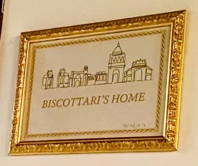 a picture of a framed picture of a house at Biscottari's home in Palermo