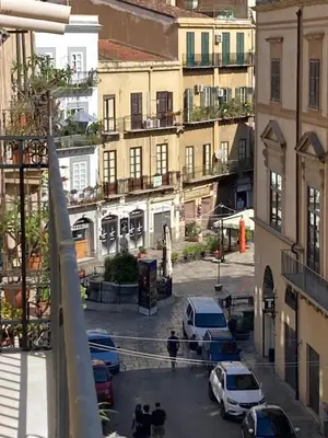 a view of a city street with cars parked at B&B Garibaldi in Palermo