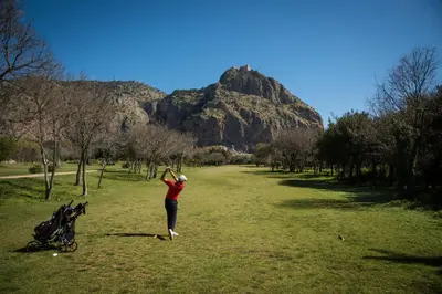 a woman standing in a field flying a kite at YourLife Suite1 - Deliziosa casa con terrazzino in Palermo
