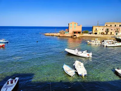 a group of boats in a body of water at La Casetta di Mari by Holiday World in Villabate