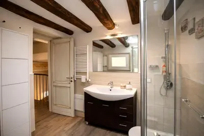 a bathroom with a sink and a shower at Le Quattro Stagioni - Apartments in Palermo