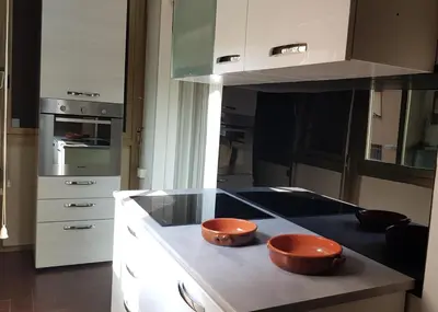 a kitchen with two bowls on top of a counter at Pinhouse Apartment in Palermo