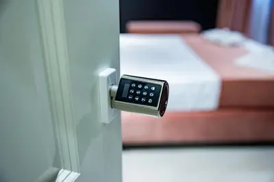 a door with a remote control sticking out of it at SUPREME Suite&Spa in Palermo
