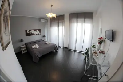 a view of a bedroom with a bed and a window at Bed and Breakfast Palermo Centro in Palermo