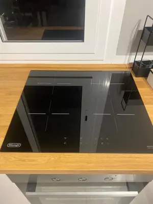 a microwave oven sitting on top of a counter at Giuse home in Palermo