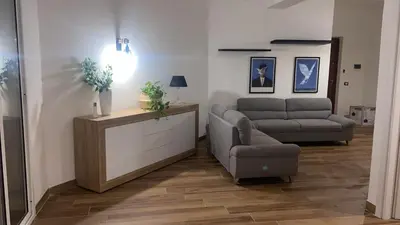 a living room with a couch and a chair at Francys Dreams in Palermo