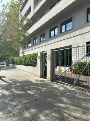 a building with a gate in front of it at Francys Dreams in Palermo