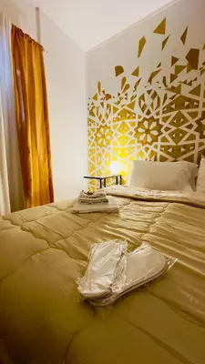 a bed with a plastic item on it in a bedroom at Casa Lilla in Monreale