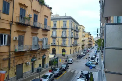 a view of a city street with cars parked at Casa Amari Bd in Palermo