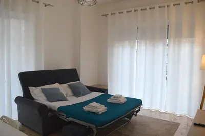 a bedroom with a bed with towels on it at Casa Amari Bd in Palermo