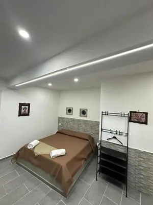 a bedroom with a bed in a room at Luna di Sicilia in Palermo